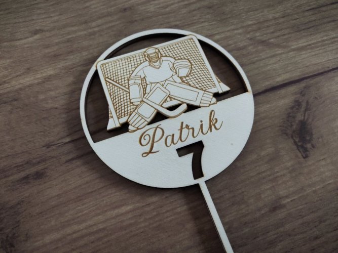 Zápich na dort s hokejovým brankářem a brankou